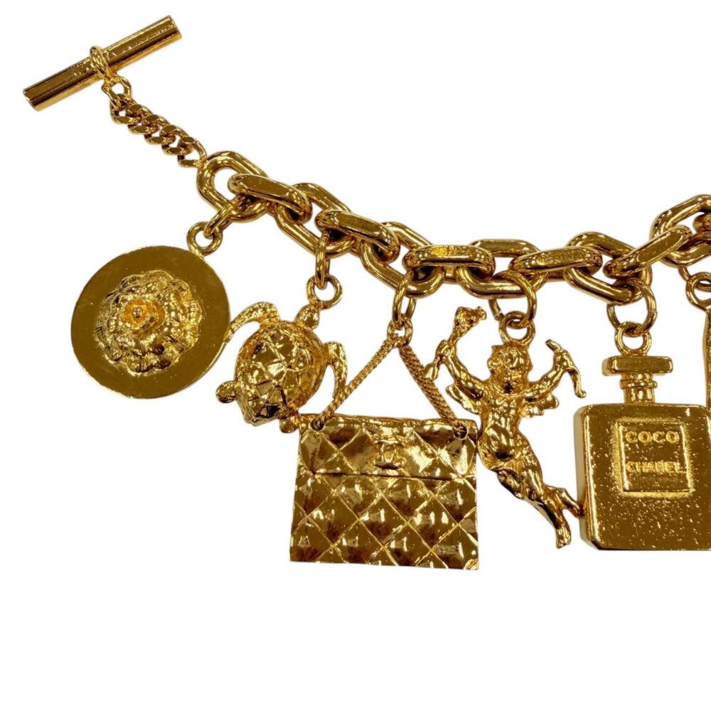 CHANEL Vintage Metal Icon Charm 7-Strand Bangle Bracelet, Gold, Weight 205g, ... - Picture 4 of 9
